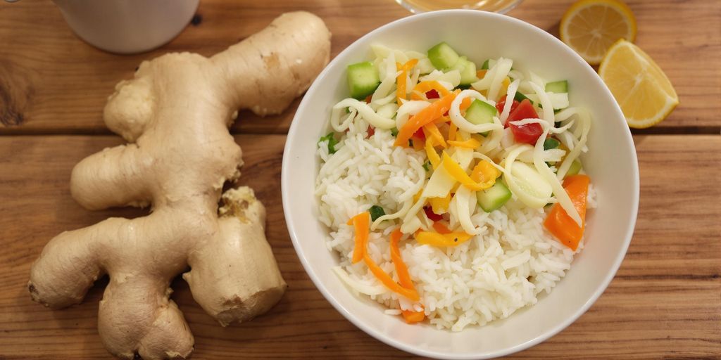 Bowl of rice and veggies for stomach relief.