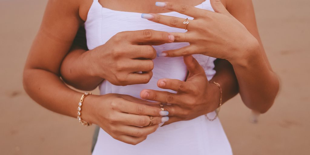 a group of people holding hands